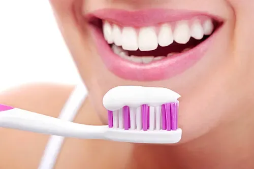 Professional in-clinic teeth whitening versus at-home whitening kit results comparison — Dr. Sri Sushma Dental Clinic Anandbagh Hyderabad
